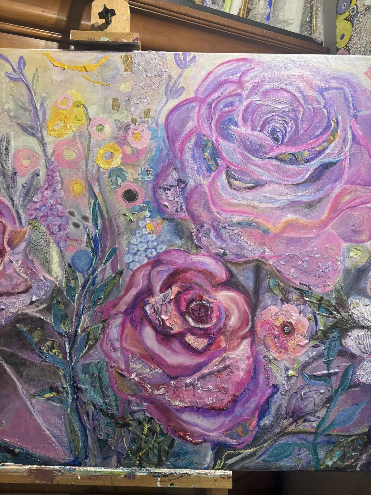Detail of layered purple and pink roses and wildflowers in the nearly finished commission by Agata May'kowska