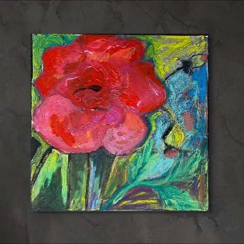 Sold original by Agata May'kowska — Abstract painting of a red and pink flower with green leaves and a blue background, displayed on a black wall.