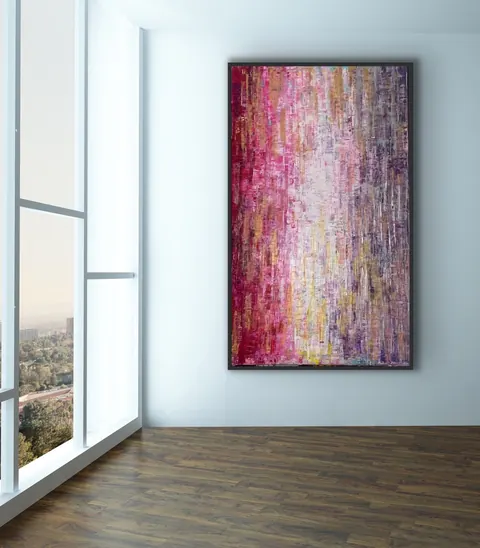 Sold original by Agata May'kowska — An abstract pink and purple painting with textured brushstrokes on a vertical canvas, mounted on a white wall in a modern room with hardwood floors and large windows…