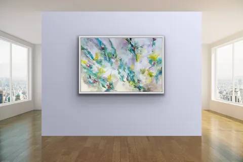 Sold original by Agata May'kowska — An abstract watercolor painting with vibrant colors displayed on a white wall in a modern art gallery with large windows showing a cityscape.