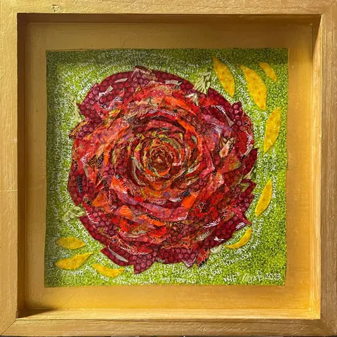 Sold original by Agata May'kowska — Collage art of a red rose with green and yellow background, surrounded by handwritten white text on green and yellow fabric.