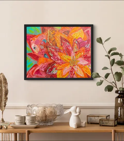 Sold original by Agata May'kowska — Colorful abstract floral artwork in a black frame hanging on a beige wall above a wooden console table with decorative items including a glass bowl with eggs, two small…