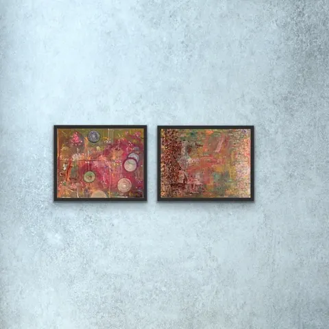 Sold original by Agata May'kowska — Two abstract paintings with colorful, textured designs hanging on a plain light gray wall.